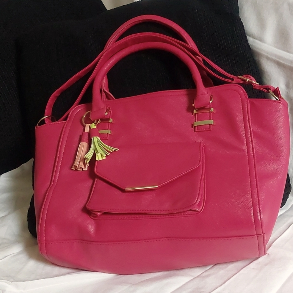 Large pink handbag with crossbody strap